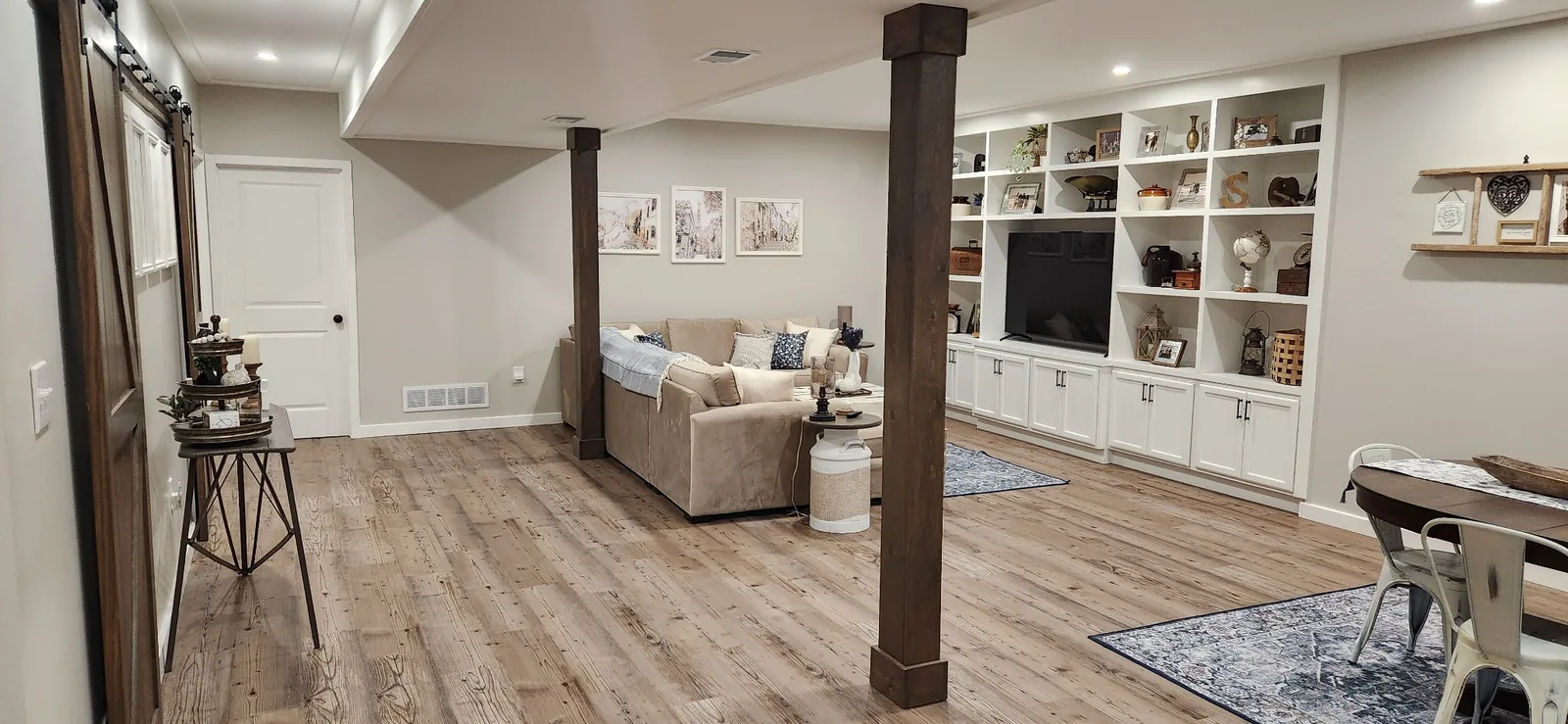 Finished basement living and dining area by New Beginnings Construction and Design