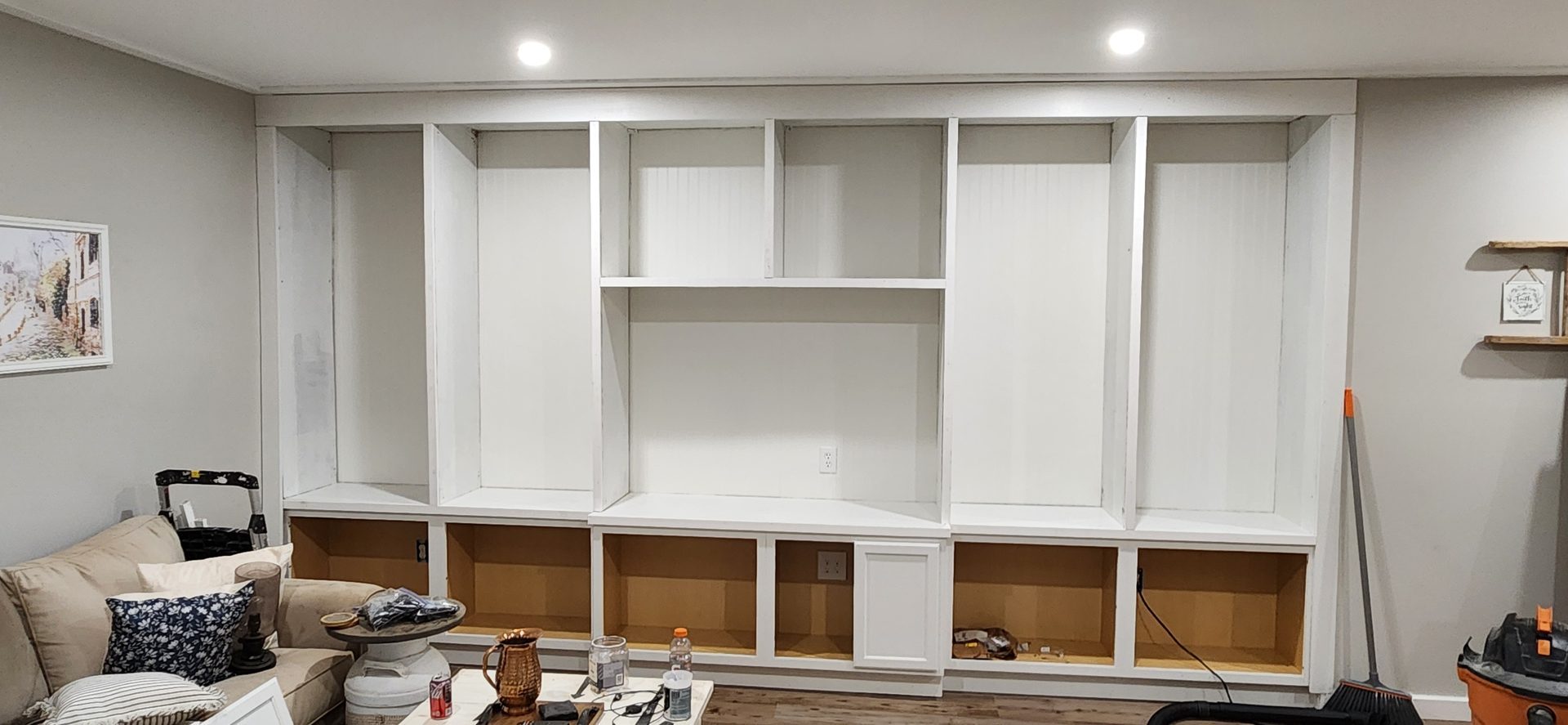 Custom white built-in shelving and cabinetry