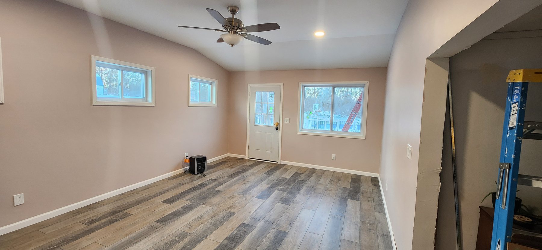 Finished Irwin home addition by New Beginnings Construction & Design