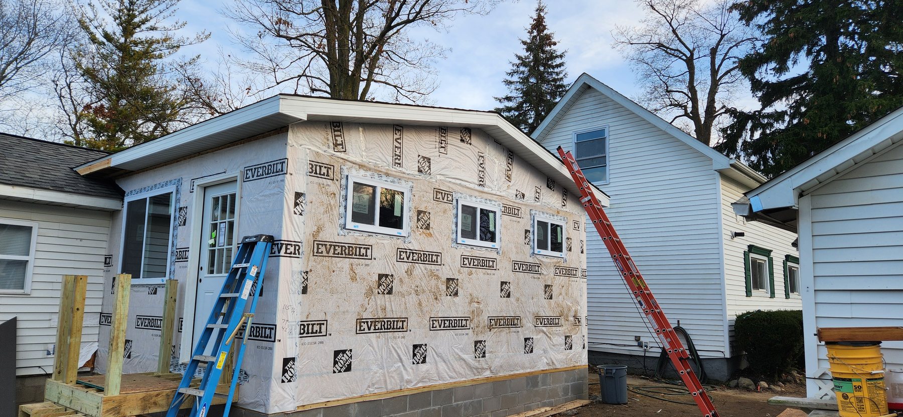 Irwin addition framed and weather wrapped during construction